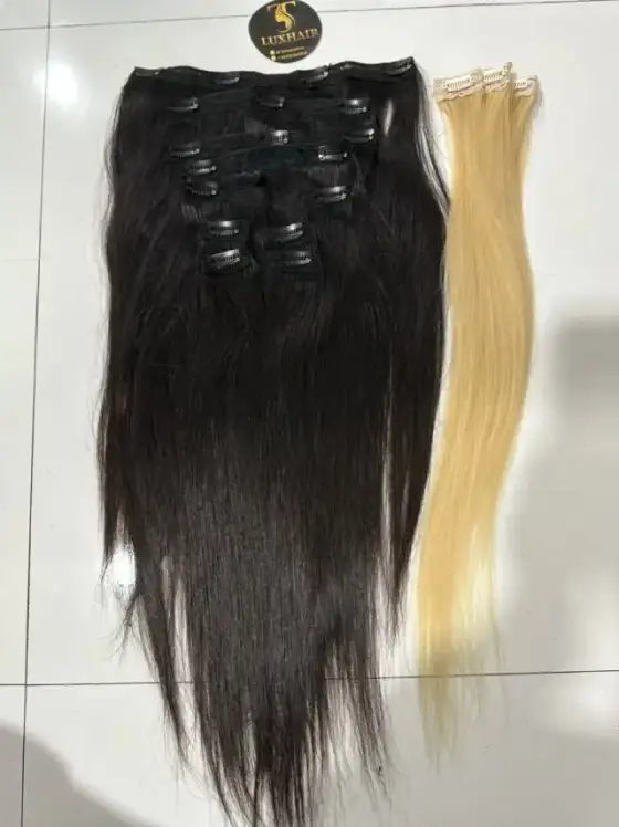 Natural black straight clip-in set beside a blonde clip-in